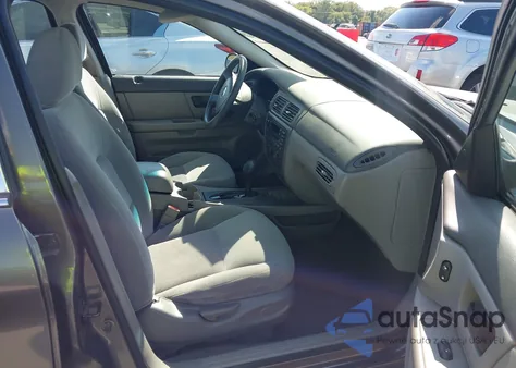 2004 Mercury Sable Gs from USA, damaged, VIN 1MEFM50U94A617443